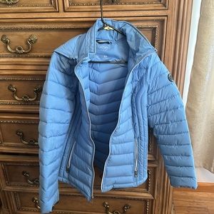 Nautica baby blue jacket in good condition. Size L but fits for like a M.